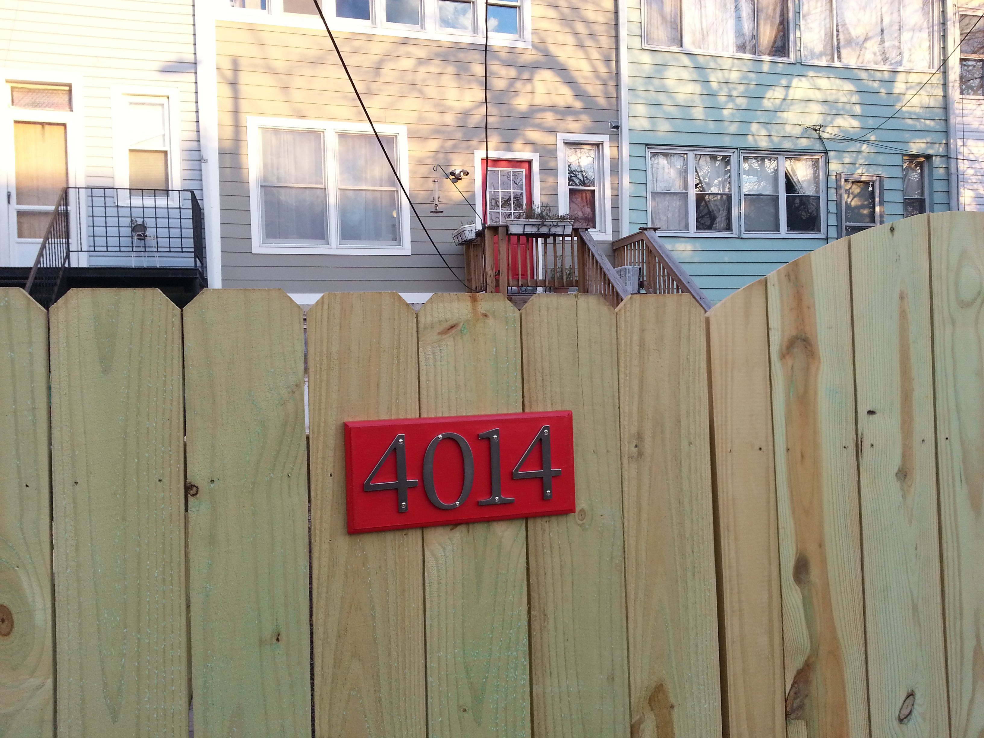 wrapping-up-the-back-fence-with-a-new-homemade-address-plate-our-old